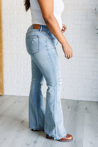 Caroline Mid Rise Control Distressed Flare Jeans