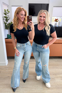Caroline Mid Rise Control Distressed Flare Jeans