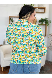 Double Take Full Size Printed Smocked Long Sleeve Blouse