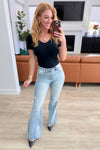 Caroline Mid Rise Control Distressed Flare Jeans