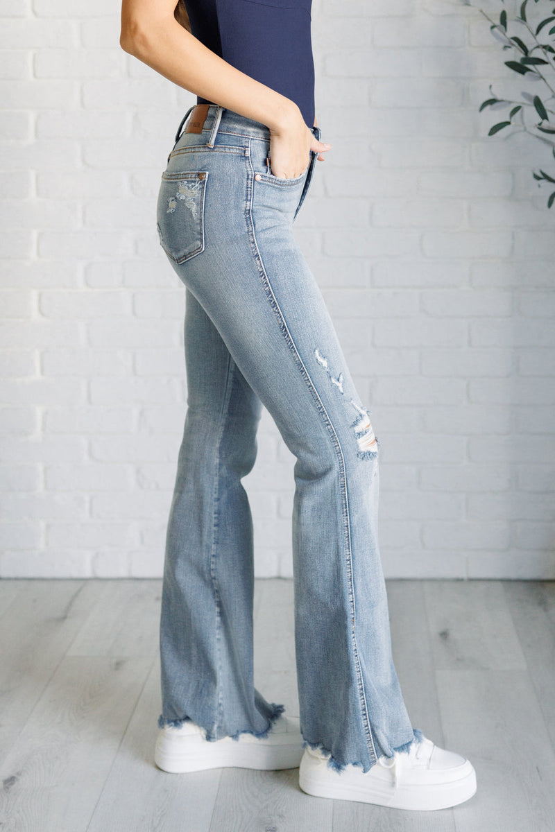 Caroline Mid Rise Control Distressed Flare Jeans