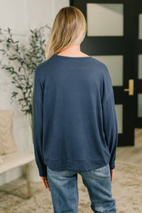 Genuine Interest Long Sleeve Top